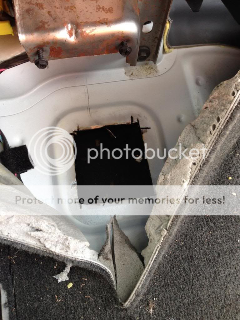 We removed the auto transmission, transfer case, and drive shafts.